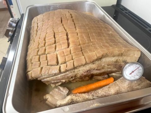 Pork belly in a pan ready for the oven