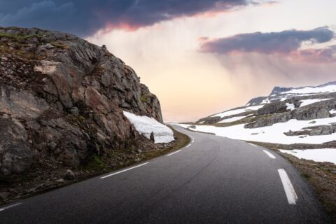 Mountain road with snow in Norway